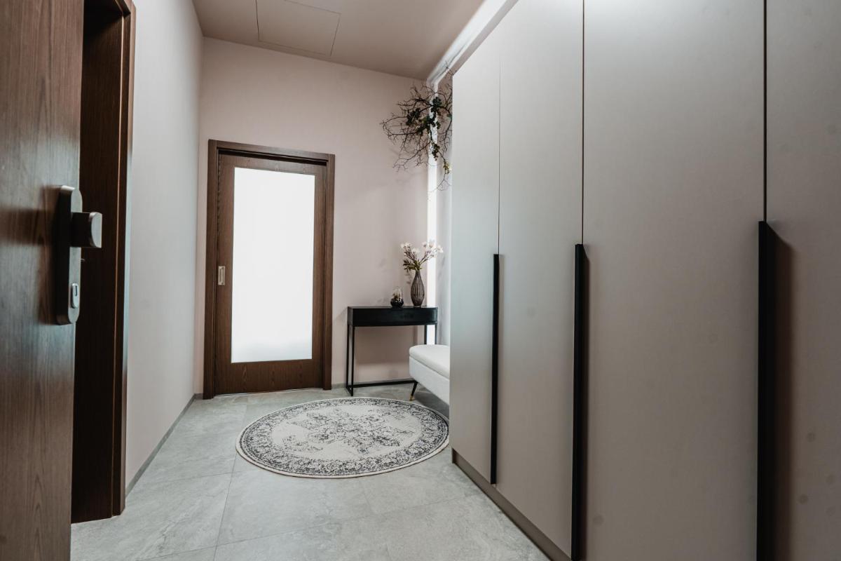 Luxusní zahradní rezidence – 3 min od centra, 2 ložnice, zahrada, 117 m2 — 7