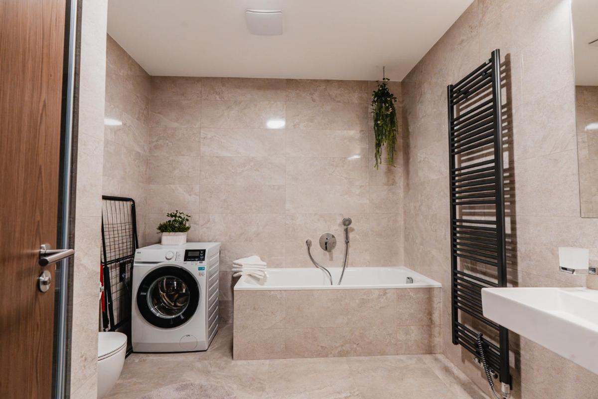 Luxusní zahradní rezidence – 3 min od centra, 2 ložnice, zahrada, 117 m2 — 5